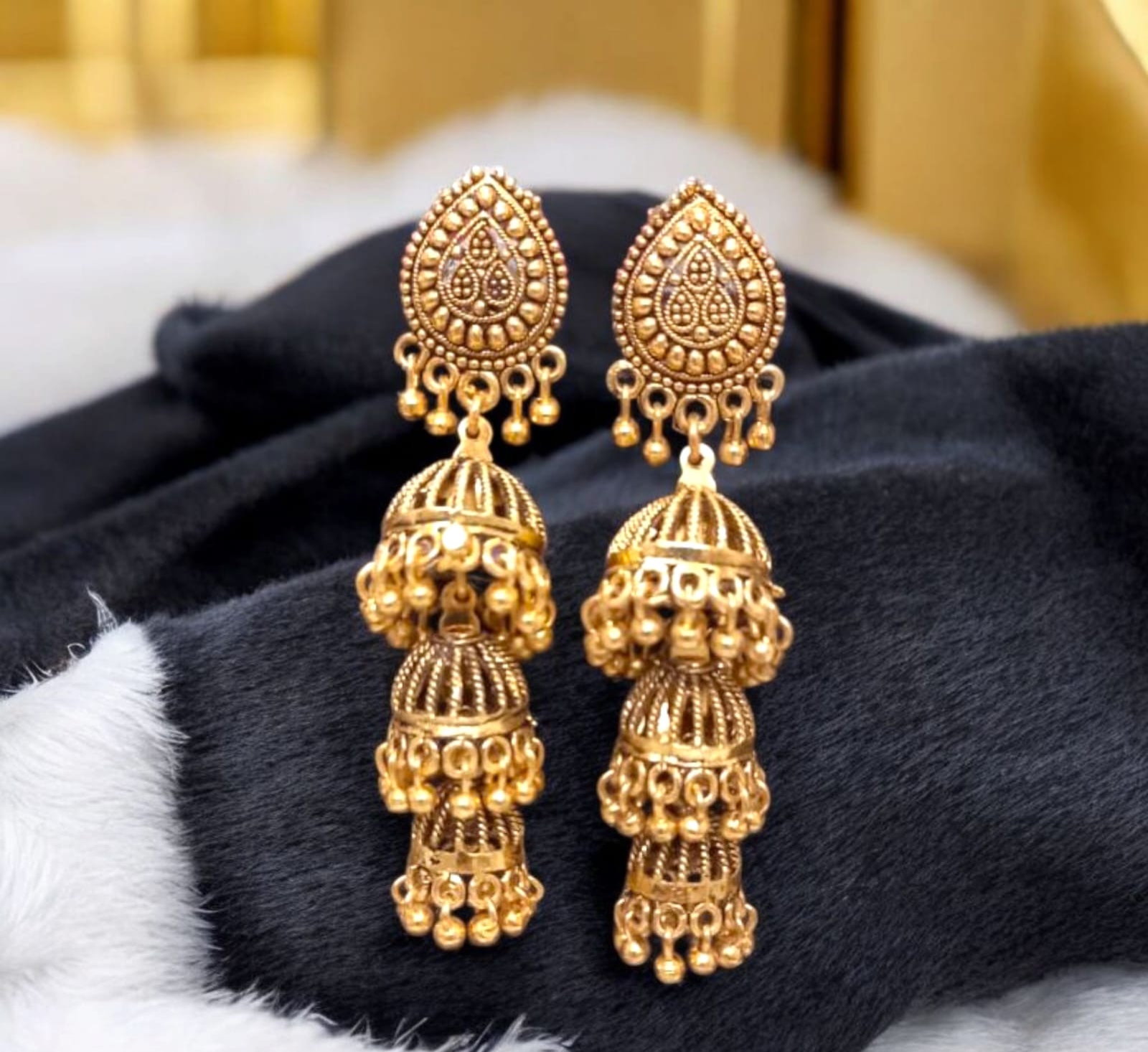 Traditional Gold-Plated Three-Tier Jhumka Earrings
